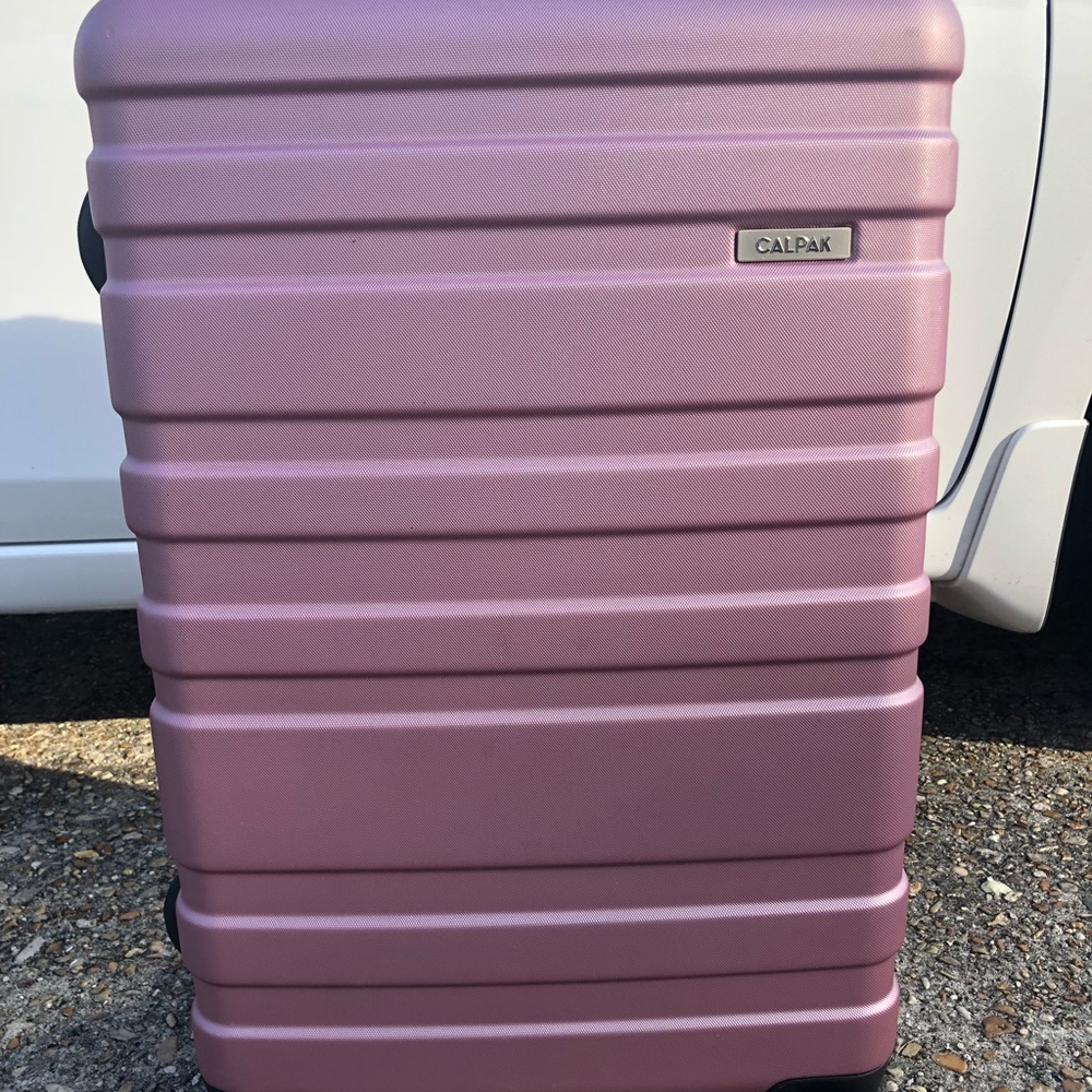 Pink/Purple Calpak Luggage Suitcase